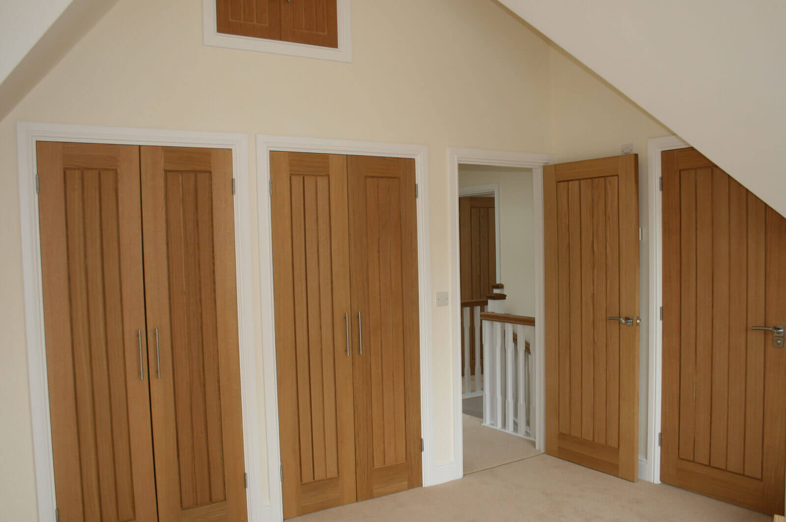 Bedroom with double in-built wardrobes.