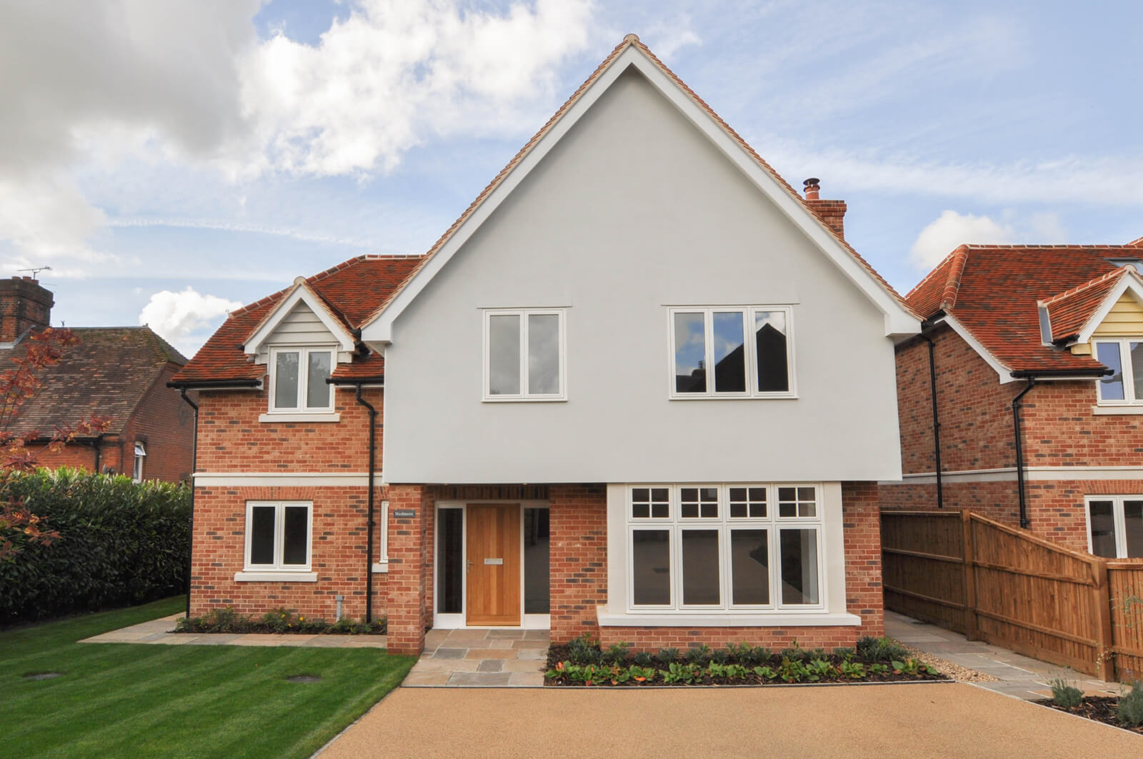 Front view of Wedmore detached house, with driveway and garden.